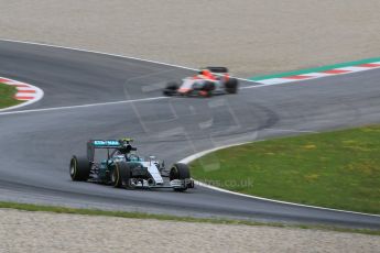 World © Octane Photographic Ltd. Mercedes AMG Petronas F1 W06 Hybrid – Nico Rosberg and Manor Marussia F1 Team MR03B – Roberto Merhi. Friday 19th June 2015, F1 Practice 2, Red Bull Ring, Spielberg, Austria. Digital Ref: 1306CB7D3884