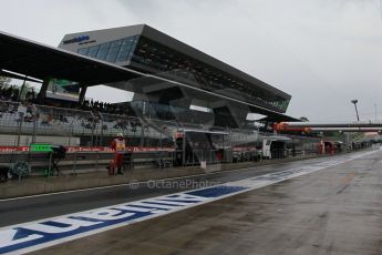 World © Octane Photographic Ltd. Wet pit lane. Saturday 20th June 2015, F1 Austrian GP Practice 3, Red Bull Ring, Spielberg, Austria. Digital Ref: 1311LW1L3598