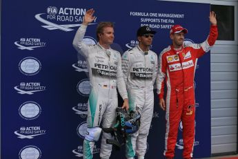 World © Octane Photographic Ltd. Mercedes AMG Petronas F1 W06 Hybrid – Lewis Hamilton and Nico Rosberg and Scuderia Ferrari SF15-T– Sebastian Vettel. Saturday 20th June 2015, F1 Qualifying Parc Ferme, Red Bull Ring, Spielberg, Austria. Digital Ref: 1312LB1D8446