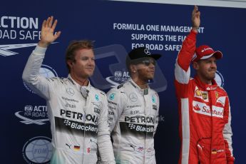 World © Octane Photographic Ltd. Mercedes AMG Petronas F1 W06 Hybrid – Lewis Hamilton and Nico Rosberg and Scuderia Ferrari SF15-T– Sebastian Vettel. Saturday 20th June 2015, F1 Qualifying Parc Ferme, Red Bull Ring, Spielberg, Austria. Digital Ref: 1312LB1D8454