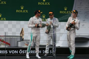World © Octane Photographic Ltd. Mercedes AMG Petronas F1 W06 Hybrid – Nico Rosberg, Lewis Hamilton and Williams Martini Racing FW37 – Felipe Massa. Sunday 21st June 2015, F1 Race Podium, Red Bull Ring, Spielberg, Austria. Digital Ref: 1320LB5D8005