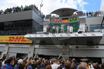 World © Octane Photographic Ltd. Mercedes AMG Petronas F1 W06 Hybrid – Nico Rosberg, Lewis Hamilton and Williams Martini Racing FW37 – Felipe Massa. Sunday 21st June 2015, F1 Race Podium, Red Bull Ring, Spielberg, Austria. Digital Ref: 1320LW1L4227