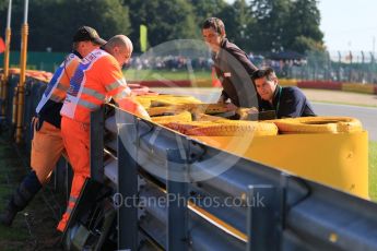 World © Octane Photographic Ltd. Repairing the barrier after the Lotus F1 Team E23 Hybrid of Pastor Maldonado crashes. Friday 21st August 2015, F1 Belgian GP Practice 1, Spa-Francorchamps, Belgium. Digital Ref: 1373LB7D4745