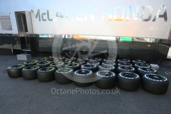 World © Octane Photographic Ltd. Pirelli medium (white) and soft (yellow) tyres next to McLaren Honda garage. Thursday 20th August 2015, F1 Belgian GP Pitlane, Spa-Francorchamps, Belgium. Digital Ref: 1370LB5D6262