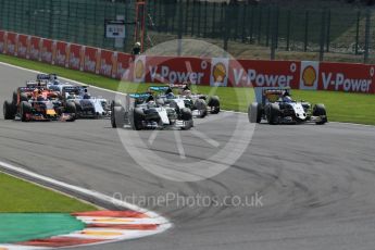World © Octane Photographic Ltd. Mercedes AMG Petronas F1 W06 Hybrid – Lewis Hamilton and Sahara Force India VJM08B – Sergio Perez side by side into La Source hairpin on lap 1. Sunday 23rd August 2015, F1 Belgian GP Race, Spa-Francorchamps, Belgium. Digital Ref: 1389LB1D2025