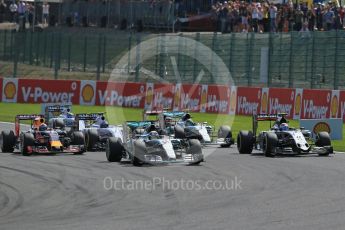 World © Octane Photographic Ltd. Mercedes AMG Petronas F1 W06 Hybrid – Lewis Hamilton and Sahara Force India VJM08B – Sergio Perez side by side into La Source hairpin on lap 1. Sunday 23rd August 2015, F1 Belgian GP Race, Spa-Francorchamps, Belgium. Digital Ref: 1389LB1D2030
