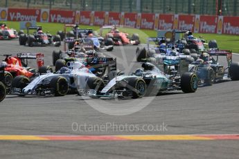 World © Octane Photographic Ltd. Mercedes AMG Petronas F1 W06 Hybrid – Nico Rosberg looses out and drops to 5th at the first corner. Sunday 23rd August 2015, F1 Belgian GP Race, Spa-Francorchamps, Belgium. Digital Ref: 1389LB1D2048