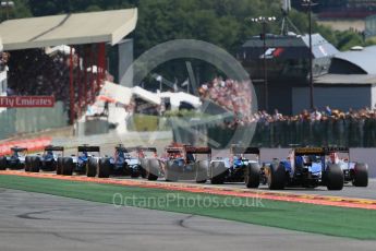 World © Octane Photographic Ltd. The pack heads down toward Eau Rouge for the first time. Sunday 23rd August 2015, F1 Belgian GP Race, Spa-Francorchamps, Belgium. Digital Ref: 1389LB1D2067