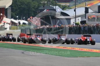 World © Octane Photographic Ltd. The pack heads down toward Eau Rouge for the first time. Sunday 23rd August 2015, F1 Belgian GP Race, Spa-Francorchamps, Belgium. Digital Ref: 1389LB1D2082
