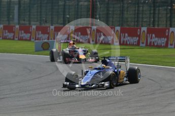 World © Octane Photographic Ltd. Sauber F1 Team C34-Ferrari – Marcus Ericsson and Infiniti Red Bull Racing RB11 – Daniil Kvyat. Sunday 23rd August 2015, F1 Belgian GP Race, Spa-Francorchamps, Belgium. Digital Ref: 1389LB1D2125
