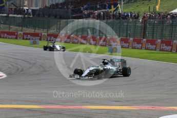 World © Octane Photographic Ltd. Mercedes AMG Petronas F1 W06 Hybrid – Lewis Hamilton and Sahara Force India VJM08B – Sergio Perez. Sunday 23rd August 2015, F1 Belgian GP Race, Spa-Francorchamps, Belgium. Digital Ref: 1389LB5D9980