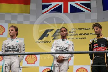 World © Octane Photographic Ltd. Mercedes AMG Petronas F1 W06 Hybrid – Lewis Hamilton (1st), Nico Rosberg (2nd) and Lotus F1 Team E23 Hybrid – Romain Grosjean (3rd). Sunday 23rd August 2015, F1 Belgian GP Podium, Spa-Francorchamps, Belgium. Digital Ref: 1390LB1D2296