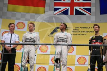 World © Octane Photographic Ltd. Mercedes AMG Petronas F1 W06 Hybrid – Lewis Hamilton (1st), Nico Rosberg (2nd) and Lotus F1 Team E23 Hybrid – Romain Grosjean (3rd). Sunday 23rd August 2015, F1 Belgian GP Podium, Spa-Francorchamps, Belgium. Digital Ref: 1390LB1D2307