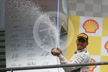 World © Octane Photographic Ltd. Mercedes AMG Petronas F1 W06 Hybrid – Lewis Hamilton (1st). Sunday 23rd August 2015, F1 Belgian GP Podium, Spa-Francorchamps, Belgium. Digital Ref: 1390LB1D2424