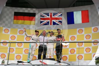 World © Octane Photographic Ltd. Mercedes AMG Petronas F1 W06 Hybrid – Lewis Hamilton (1st), Nico Rosberg (2nd) and Lotus F1 Team E23 Hybrid – Romain Grosjean (3rd). Sunday 23rd August 2015, F1 Belgian GP Podium, Spa-Francorchamps, Belgium. Digital Ref: 1390LB1D2511