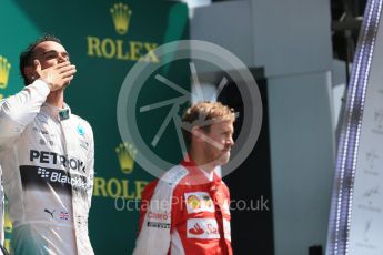 World © Octane Photographic Ltd. Scuderia Ferrari SF15-T– Sebastian Vettel and Mercedes AMG Petronas F1 W06 Hybrid – Lewis Hamilton. Sunday 5th July 2015, F1 British GP Podium, Silverstone, UK. Digital Ref: 1342LB1D6766