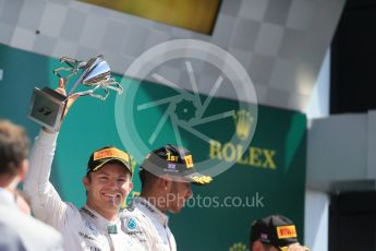 World © Octane Photographic Ltd. Mercedes AMG Petronas F1 W06 Hybrid – Nico Rosberg and Lewis Hamilton. Sunday 5th July 2015, F1 Podium, Silverstone, UK. Digital Ref: 1342LB1D6880