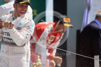 World © Octane Photographic Ltd. Scuderia Ferrari SF15-T– Sebastian Vettel and Mercedes AMG Petronas F1 W06 Hybrid – Lewis Hamilton. Sunday 5th July 2015, F1 British GP Podium, Silverstone, UK. Digital Ref: 1342LB1D6915