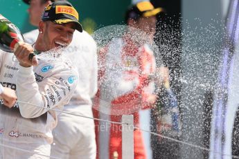 World © Octane Photographic Ltd. Scuderia Ferrari SF15-T– Sebastian Vettel and Mercedes AMG Petronas F1 W06 Hybrid – Lewis Hamilton. Sunday 5th July 2015, F1 British GP Podium, Silverstone, UK. Digital Ref: 1342LB1D6921