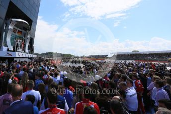 World © Octane Photographic Ltd. Media and team at the podium celebrations. Sunday 5th July 2015, F1 British GP Podium, Silverstone, UK. Digital Ref: 1342LB5D9993