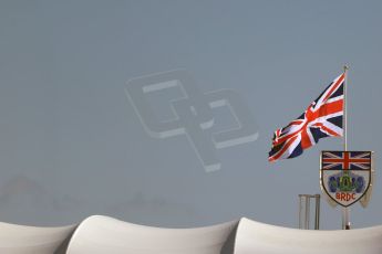 World © Octane Photographic Ltd. British flag over BRDC building. Friday 3rd July 2015, F1 Practice 1, Silverstone, UK. Digital Ref: 1327LB1D3514