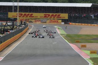 World © Octane Photographic Ltd. The F1 Grid lead by Williams Martini Racing FW37 – Felipe Massa. after he made a better start than Mercedes AMG Petronas F1 W06 Hybrid – Lewis Hamilton Sunday 5th July 2015, F1 British GP Race, Silverstone, UK. Digital Ref: 1341LB1D6395