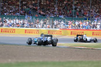 World © Octane Photographic Ltd. Williams Martini Racing FW37 – Felipe Massa, Valtteri Bottas and Mercedes AMG Petronas F1 W06 Hybrid – Lewis Hamilton. Sunday 5th July 2015, F1 British GP Race, Silverstone, UK. Digital Ref: 1341LB1D6638