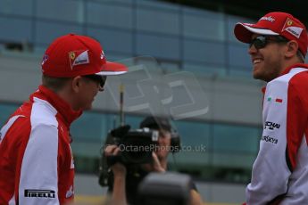 World © Octane Photographic Ltd. Scuderia Ferrari SF15-T– Sebastian Vettel and Kimi Raikkonen. Sunday 5th July 2015, F1 British GP Race - Grid, Silverstone, UK. Digital Ref: 1340LB1D6296