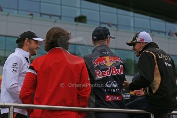 World © Octane Photographic Ltd. McLaren Honda MP4/30 - Jenson Button, Manor Marussia F1 Team MR03B – Roberto Merhi, Infiniti Red Bull Racing RB11 – Daniil Kvyat and Lotus F1 Team E23 Hybrid – Pastor Maldonado. Sunday 5th July 2015, F1 British GP Race - Grid, Silverstone, UK. Digital Ref: 1340LB1D6306