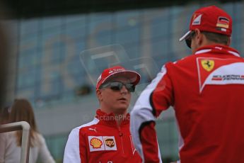 World © Octane Photographic Ltd. Scuderia Ferrari SF15-T– Sebastian Vettel and Kimi Raikkonen. Sunday 5th July 2015, F1 British GP Race - Grid, Silverstone, UK. Digital Ref: 1340LB1D6308