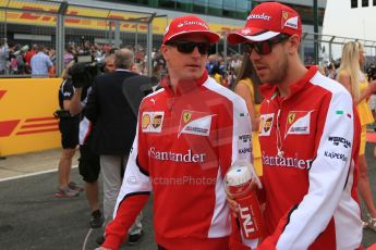 World © Octane Photographic Ltd. Scuderia Ferrari SF15-T– Sebastian Vettel and Kimi Raikkonen. Sunday 5th July 2015, F1 British GP Race - Grid, Silverstone, UK. Digital Ref: 1340LB5D9755
