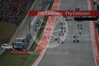 World © Octane Photographic Ltd. Mercedes AMG Petronas F1 W06 Hybrid – Nico Rosberg and Lewis Hamilton battle up to turn 1. Sunday 25th October 2015, F1 USA Grand Prix Race, Austin, Texas - Circuit of the Americas (COTA). Digital Ref: 1466LB1D1721