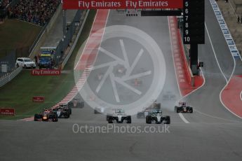 World © Octane Photographic Ltd. Mercedes AMG Petronas F1 W06 Hybrid – Nico Rosberg and Lewis Hamilton battle up to turn 1. Sunday 25th October 2015, F1 USA Grand Prix Race, Austin, Texas - Circuit of the Americas (COTA). Digital Ref: 1466LB1D1750