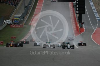 World © Octane Photographic Ltd. Mercedes AMG Petronas F1 W06 Hybrid – Nico Rosberg and Lewis Hamilton battle up to turn 1. Sunday 25th October 2015, F1 USA Grand Prix Race, Austin, Texas - Circuit of the Americas (COTA). Digital Ref: 1466LB1D1755