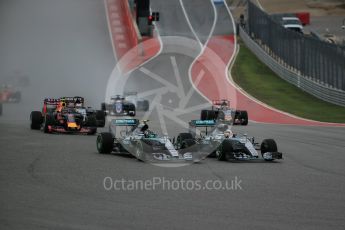 World © Octane Photographic Ltd. Mercedes AMG Petronas F1 W06 Hybrid – Nico Rosberg and Lewis Hamilton battle up to turn 1. Sunday 25th October 2015, F1 USA Grand Prix Race, Austin, Texas - Circuit of the Americas (COTA). Digital Ref: 1466LB1D1764