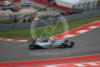 World © Octane Photographic Ltd. Mercedes AMG Petronas F1 W06 Hybrid – Nico Rosberg and Lewis Hamilton battle up to turn 1. Sunday 25th October 2015, F1 USA Grand Prix Race, Austin, Texas - Circuit of the Americas (COTA). Digital Ref: 1466LB1D1769