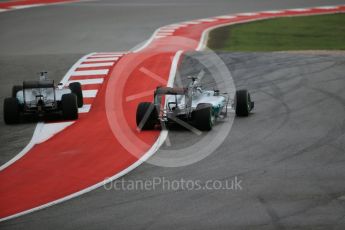World © Octane Photographic Ltd. Mercedes AMG Petronas F1 W06 Hybrid – Nico Rosberg and Lewis Hamilton battle up to turn 1. Sunday 25th October 2015, F1 USA Grand Prix Race, Austin, Texas - Circuit of the Americas (COTA). Digital Ref: 1466LB1D1784