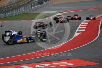 World © Octane Photographic Ltd. Sauber F1 Team C34-Ferrari – Marcus Ericsson misses McLaren Honda MP4/30 – Fernando Alonso. Sunday 25th October 2015, F1 USA Grand Prix Race, Austin, Texas - Circuit of the Americas (COTA). Digital Ref: 1466LB1D1796