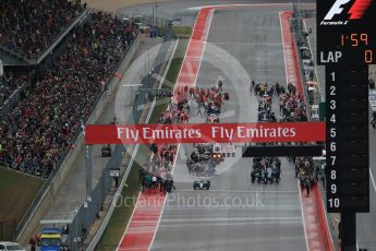 World © Octane Photographic Ltd. Mercedes AMG Petronas F1 W06 Hybrid – Nico Rosberg sits on pole. Sunday 25th October 2015, F1 USA Grand Prix Race - Grid., Austin, Texas - Circuit of the Americas (COTA). Digital Ref: 1465LB1D1636