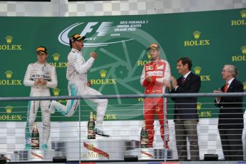 World © Octane Photographic Ltd. Mercedes AMG Petronas F1 W06 Hybrid – Lewis Hamilton, Nico Rosberg and Scuderia Ferrari SF15-T– Sebastian Vettel. Sunday 25th October 2015, F1 USA Grand Prix Race - Podium, Austin, Texas - Circuit of the Americas (COTA). Digital Ref: 1467LB1D2578