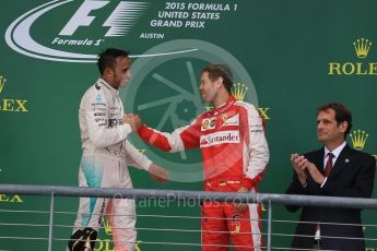 World © Octane Photographic Ltd. Mercedes AMG Petronas F1 W06 Hybrid – Lewis Hamilton and Scuderia Ferrari SF15-T– Sebastian Vettel. Sunday 25th October 2015, F1 USA Grand Prix Race - Podium, Austin, Texas - Circuit of the Americas (COTA). Digital Ref: 1467LB1D2706