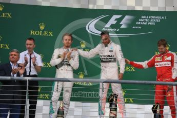 World © Octane Photographic Ltd. Mercedes AMG Petronas F1 W06 Hybrid – Lewis Hamilton, Nico Rosberg and Scuderia Ferrari SF15-T– Sebastian Vettel. Sunday 25th October 2015, F1 USA Grand Prix Race - Podium, Austin, Texas - Circuit of the Americas (COTA). Digital Ref: 1467LB1D2715