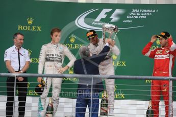 World © Octane Photographic Ltd. Mercedes AMG Petronas F1 W06 Hybrid – Lewis Hamilton, Nico Rosberg and Scuderia Ferrari SF15-T– Sebastian Vettel. Sunday 25th October 2015, F1 USA Grand Prix Race - Podium, Austin, Texas - Circuit of the Americas (COTA). Digital Ref: 1467LB1D2723