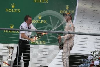 World © Octane Photographic Ltd. Mercedes AMG Petronas F1 W06 Hybrid - Lewis Hamilton and Paddy Lowe. Sunday 25th October 2015, F1 USA Grand Prix Race - Podium, Austin, Texas - Circuit of the Americas (COTA). Digital Ref: 1467LB1D2877