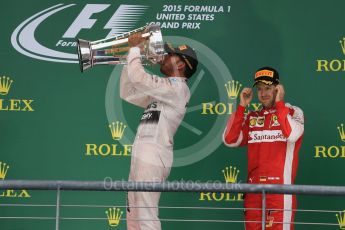 World © Octane Photographic Ltd. Mercedes AMG Petronas F1 W06 Hybrid – Lewis Hamilton and Scuderia Ferrari SF15-T– Sebastian Vettel. Sunday 25th October 2015, F1 USA Grand Prix Race - Podium, Austin, Texas - Circuit of the Americas (COTA). Digital Ref: 1467LB1D2975