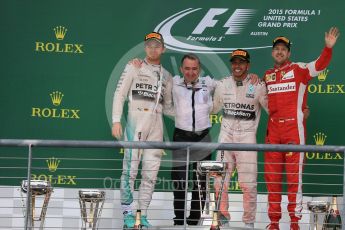 World © Octane Photographic Ltd. Mercedes AMG Petronas F1 W06 Hybrid – Lewis Hamilton, Nico Rosberg and Scuderia Ferrari SF15-T– Sebastian Vettel and Paddy Lowe from Mercedes AMG Petronas F1 team. Sunday 25th October 2015, F1 USA Grand Prix Race - Podium, Austin, Texas - Circuit of the Americas (COTA). Digital Ref: 1467LB1D3011