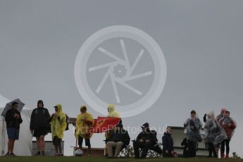 World © Octane Photographic Ltd. Formula 1 fans brave the wet weather conditions at COTA. Sunday 25th October 2015, F1 USA Grand Prix Qualifying, Austin, Texas - Circuit of the Americas (COTA). Digital Ref: 1464LB1D0670