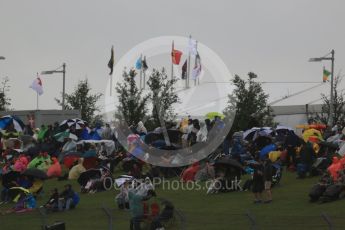 World © Octane Photographic Ltd. Formula 1 fans brave the wet weather conditions at COTA. Sunday 25th October 2015, F1 USA Grand Prix Qualifying, Austin, Texas - Circuit of the Americas (COTA). Digital Ref: 1464LB1D1023