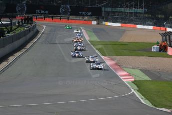 World © Octane Photographic Ltd. FIA World Endurance Championship (WEC), 6 Hours of Silverstone Race, UK, Sunday 12th April 2015. Porsche Team – Porsche 919 Hybrid - LM LMP1 – Romain Dumas, Neel Jani and Marc Lieb and Audi Sport Team Joest- Audi R18 e-tron Quatrro - LMP1 - Oliver Jarvis, Lucas di Grassi and Loic Duval. Digital Ref : 1225LB1D8564