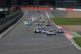 World © Octane Photographic Ltd. FIA World Endurance Championship (WEC), 6 Hours of Silverstone Race, UK, Sunday 12th April 2015. Porsche Team – Porsche 919 Hybrid - LMP1 - Timo Bernhard, Mark Webber and Brendon Hartley heads the pack in to turn 1. Digital Ref : 1225LB1D8613